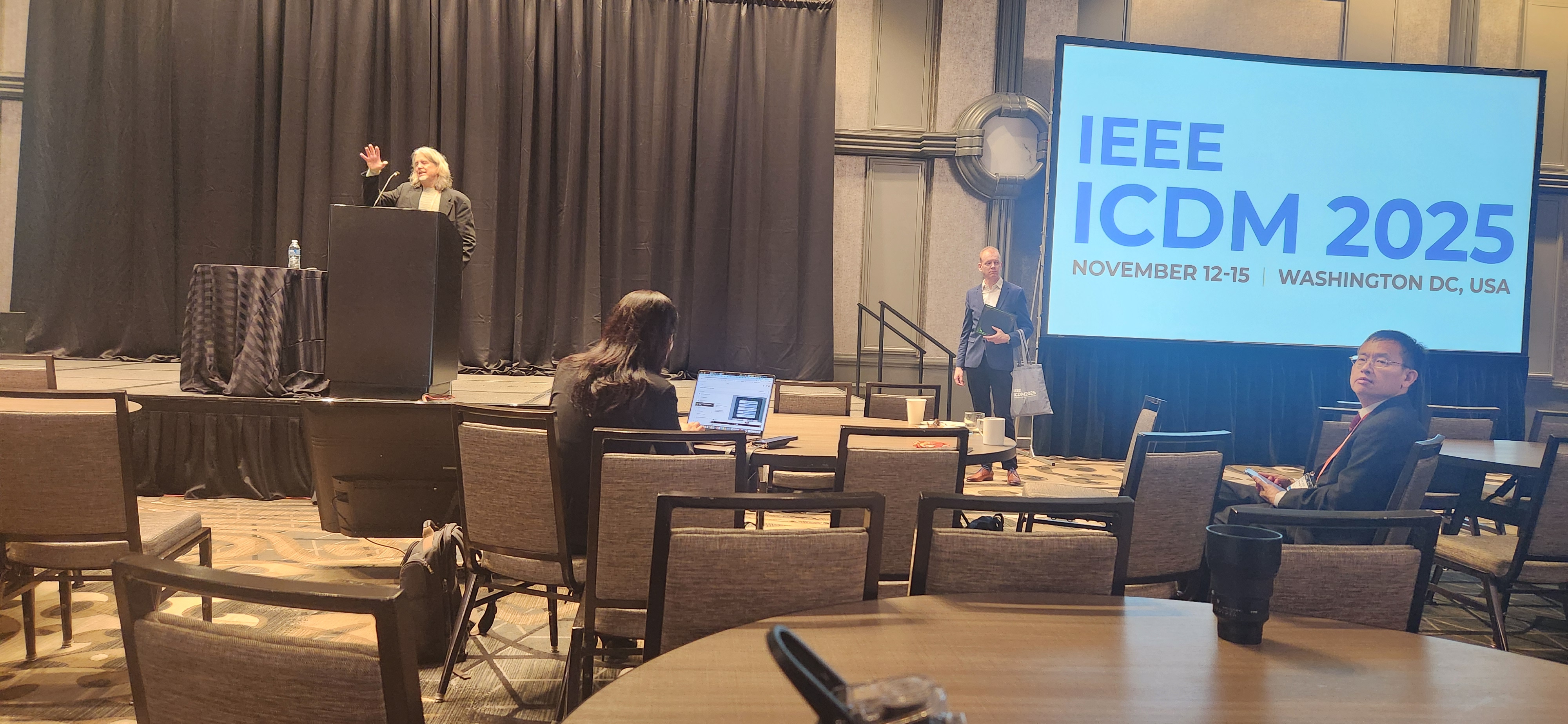 Keynote speaker gesturing during talk