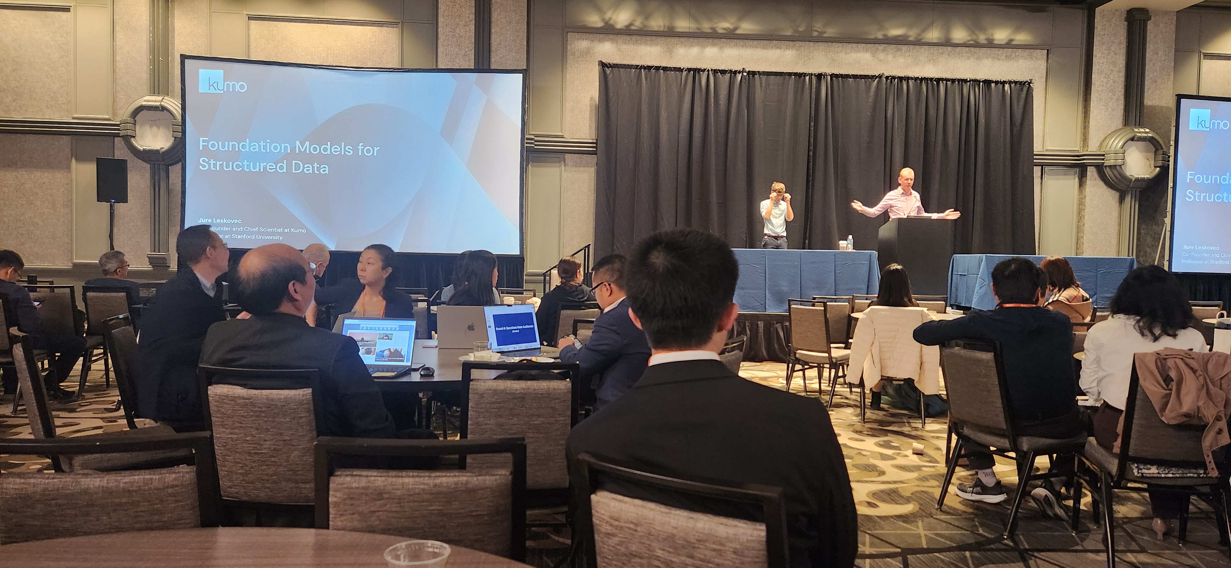 Audience listening to a keynote on foundation models for structured data.